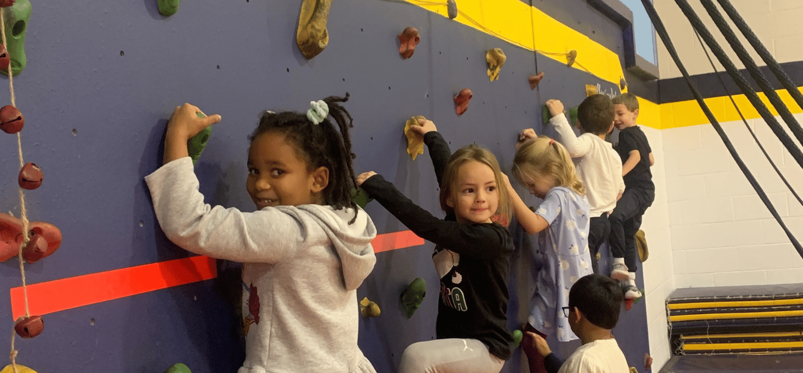 Students on the climbing wall - PE