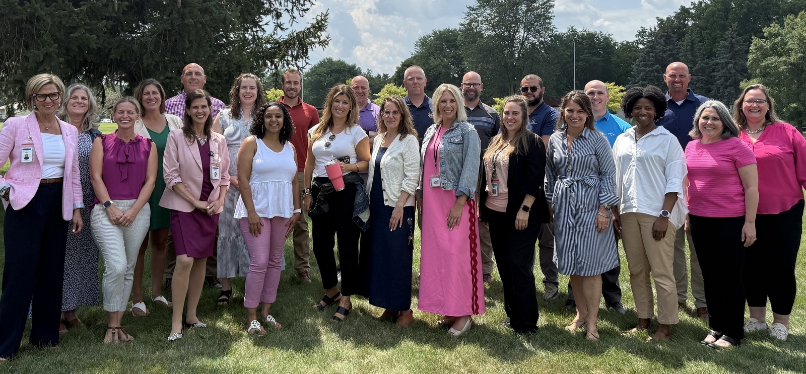 Administration Staff standing durning August 2025