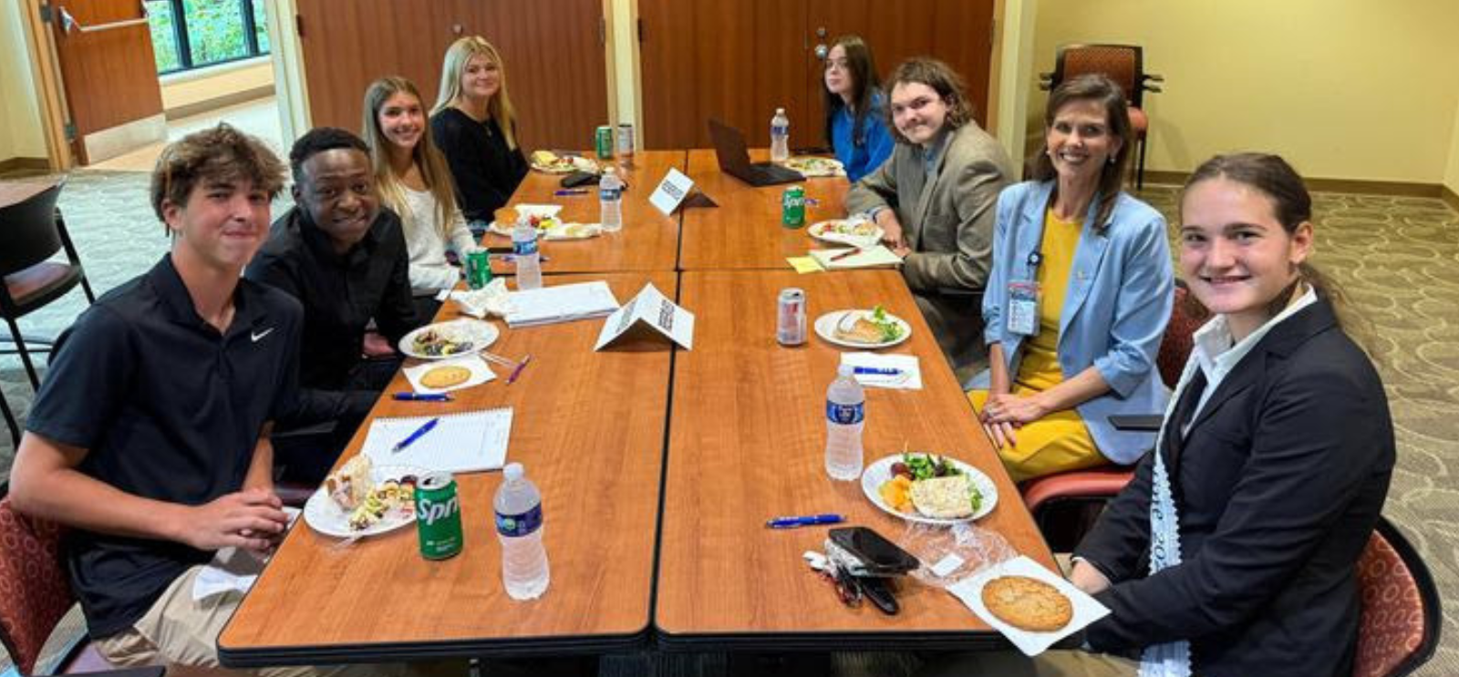 Students having lunch with the Superintendent Dr. Kowalski