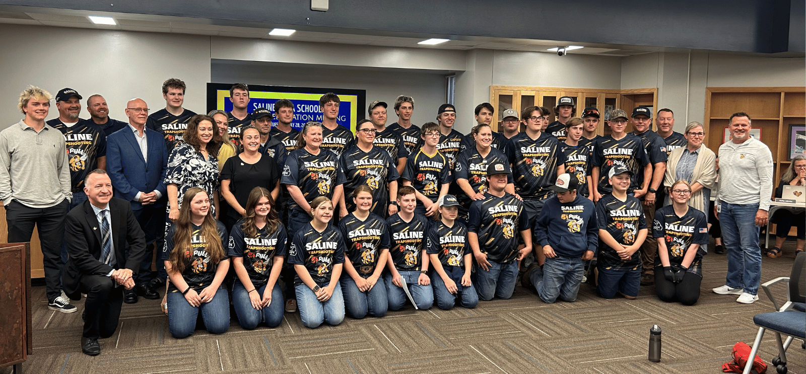 Saline Trap Shooting team at a Board of Education meeting