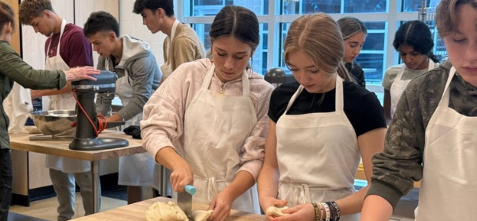 Students in Culinary Arts Class working with dough