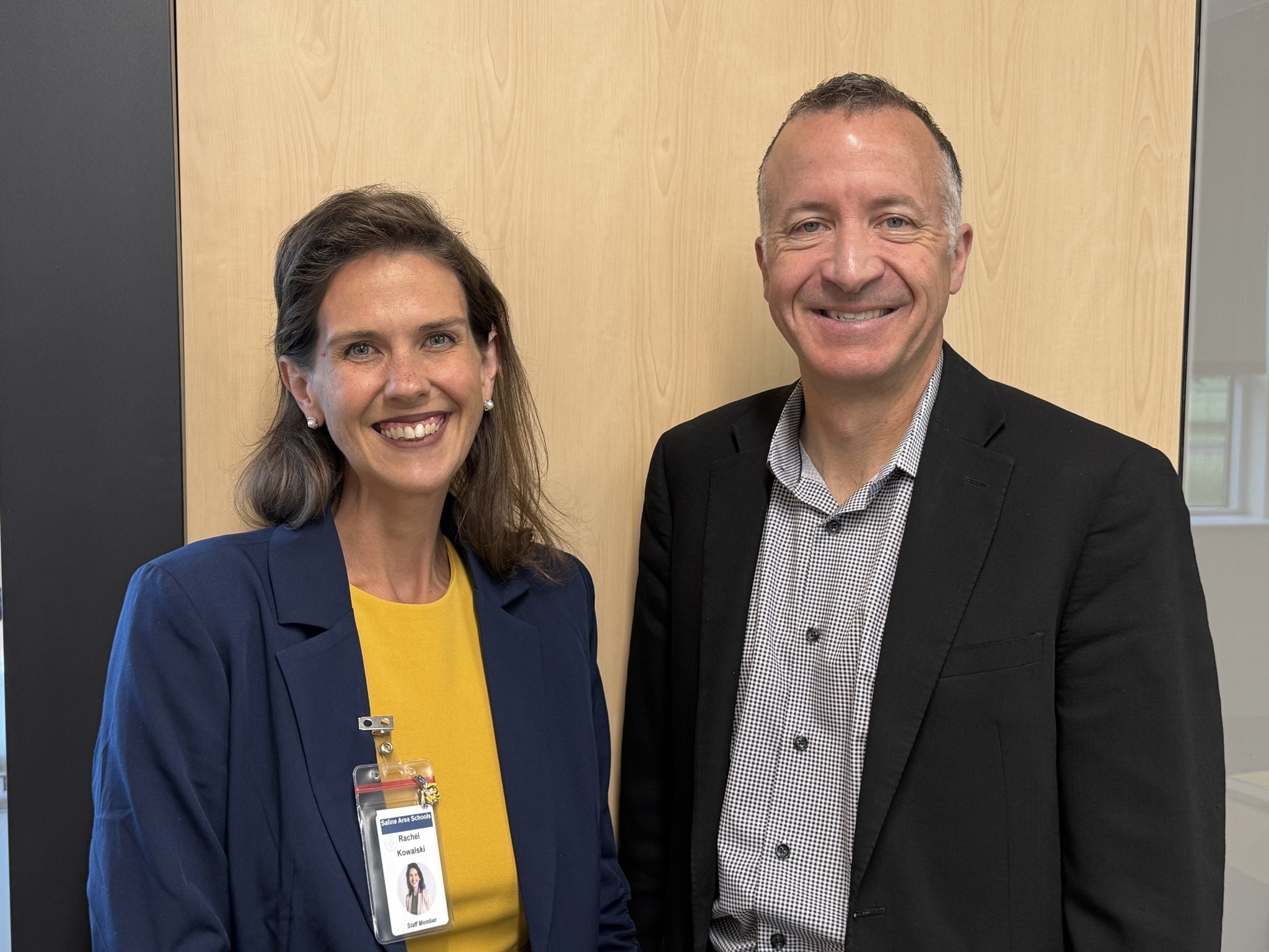 Kowalski and Laatsch standing together smiling